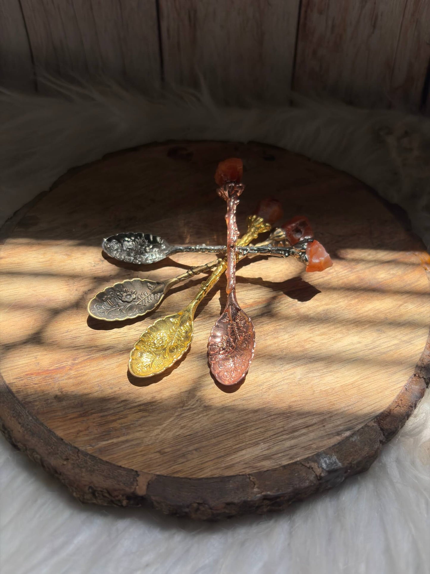 Vintage carnelian crystal spoon side view handcrafted spiritual tool