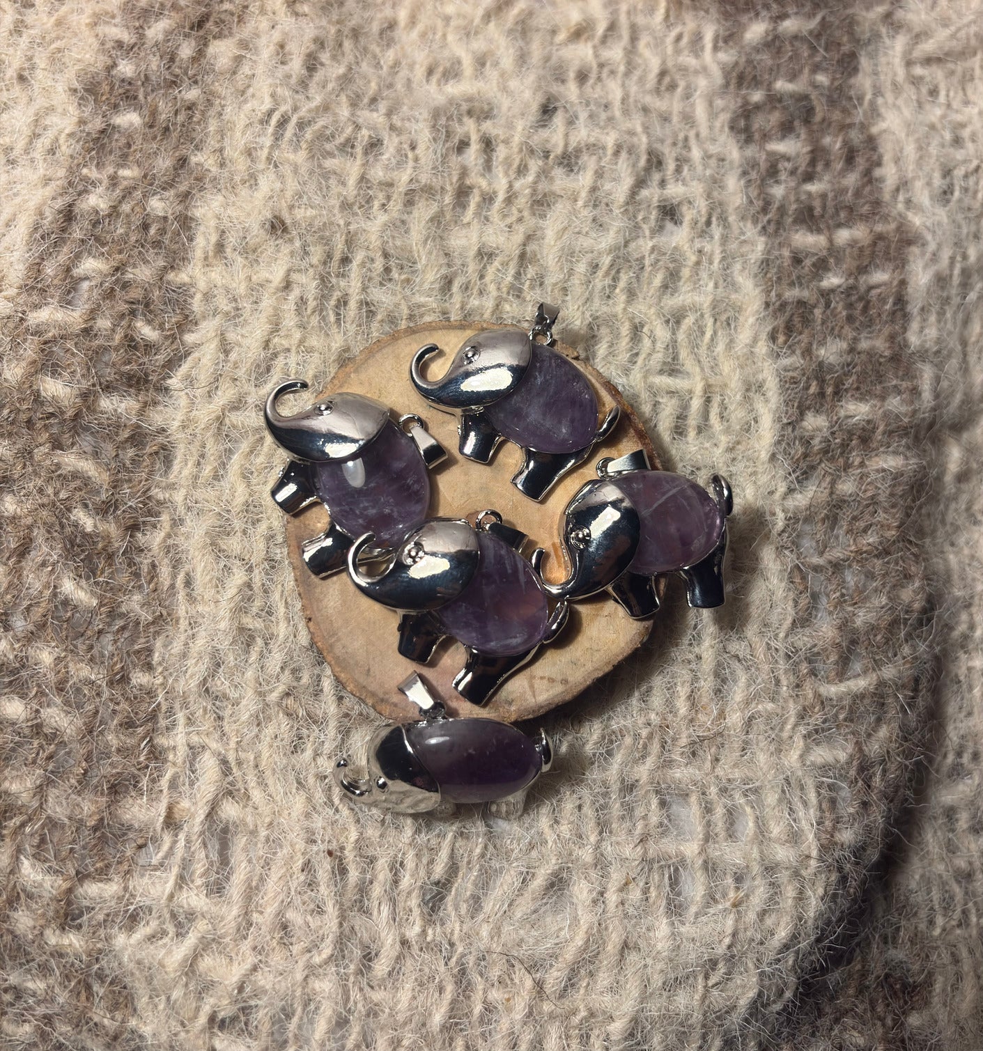 Amethyst crystal elephant necklace for Third Eye Chakra activation and spiritual awareness