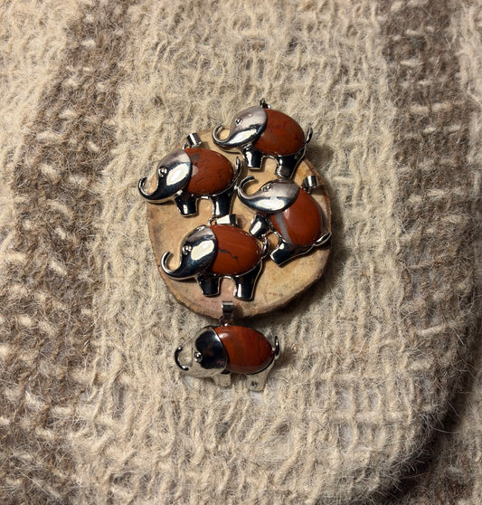 Red Jasper crystal elephant necklace for strength, stability, and emotional healing