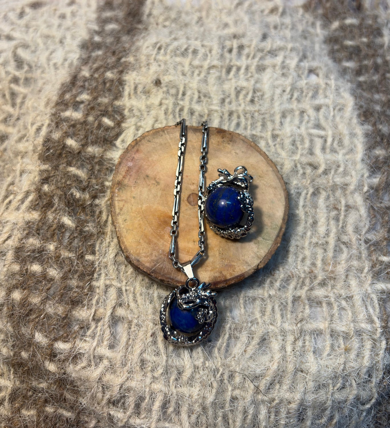 Lapis Lazuli crystal dragon sphere necklace symbolizing wisdom, protection, and self-expression