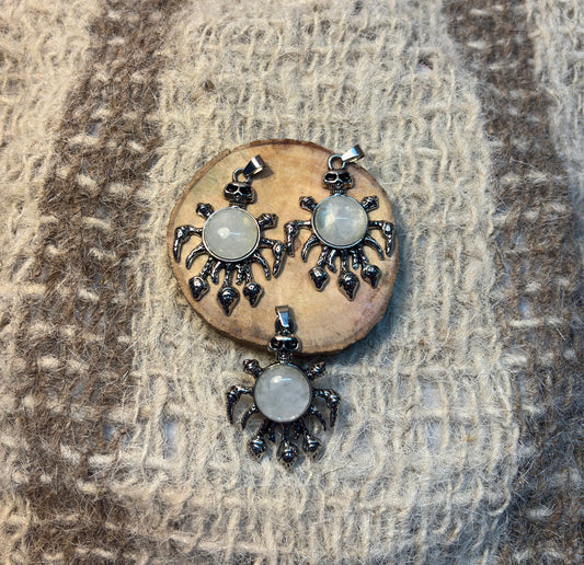 Clear Quartz crystal skull necklace symbolizing wisdom, healing, and higher consciousness