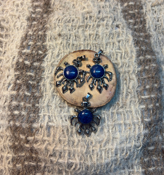 Lapis Lazuli crystal skull necklace symbolizing wisdom, truth, and self-expression
