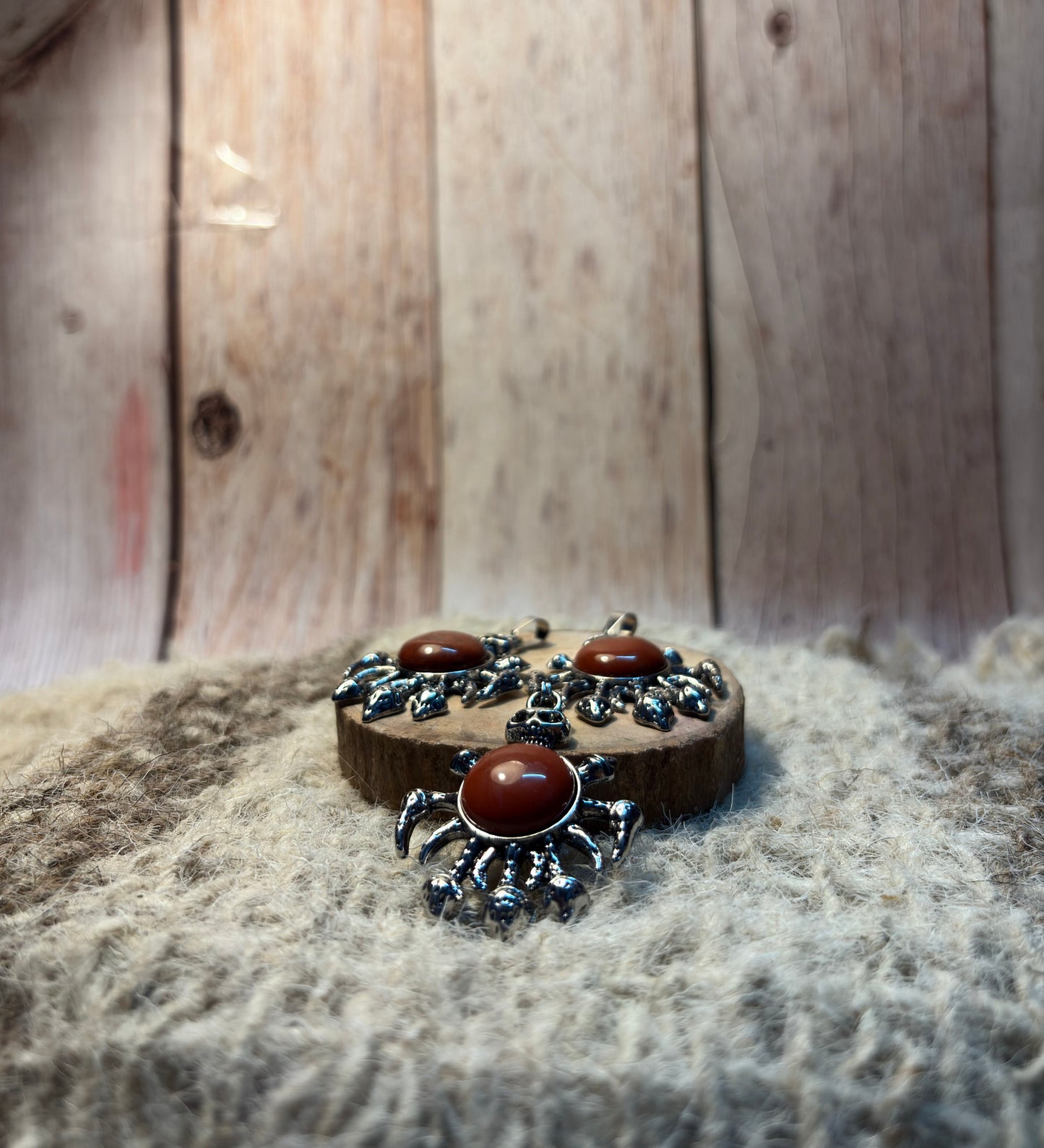 Red Jasper crystal skull necklace symbolizing courage, resilience, and transformation