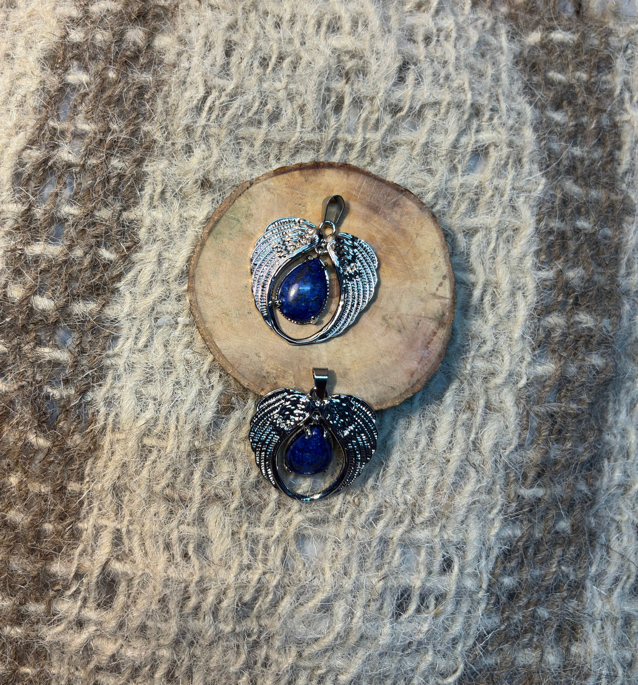 Lapis Lazuli crystal angel wings necklace symbolizing wisdom, protection, and spiritual growth