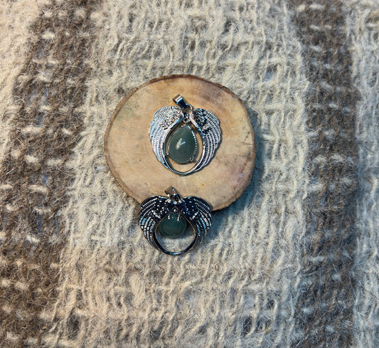 Green Aventurine crystal angel pendant symbolizing prosperity, opportunity, and growth