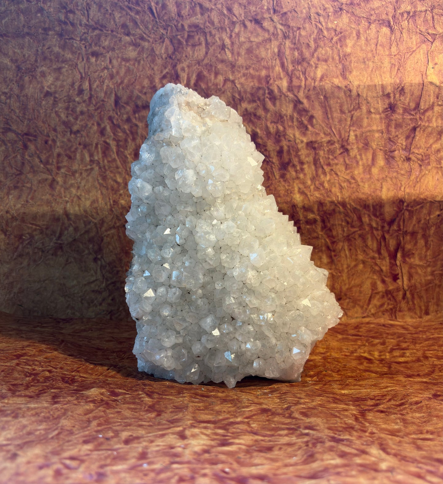 Himalayan Clear Quartz crystal geode associated with cleansing, amplification, and Crown Chakra energy