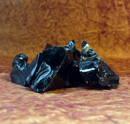 Raw Black Obsidian for protection, grounding, shadow work, and spiritual transformation