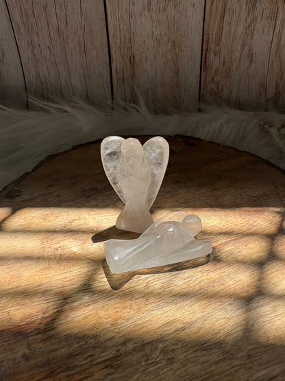 Clear quartz angel wings detail with smooth polished carving