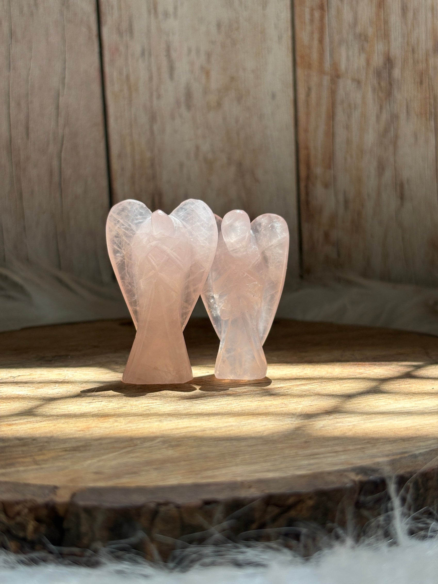 Rose quartz crystal angel for love emotional healing and positive energy