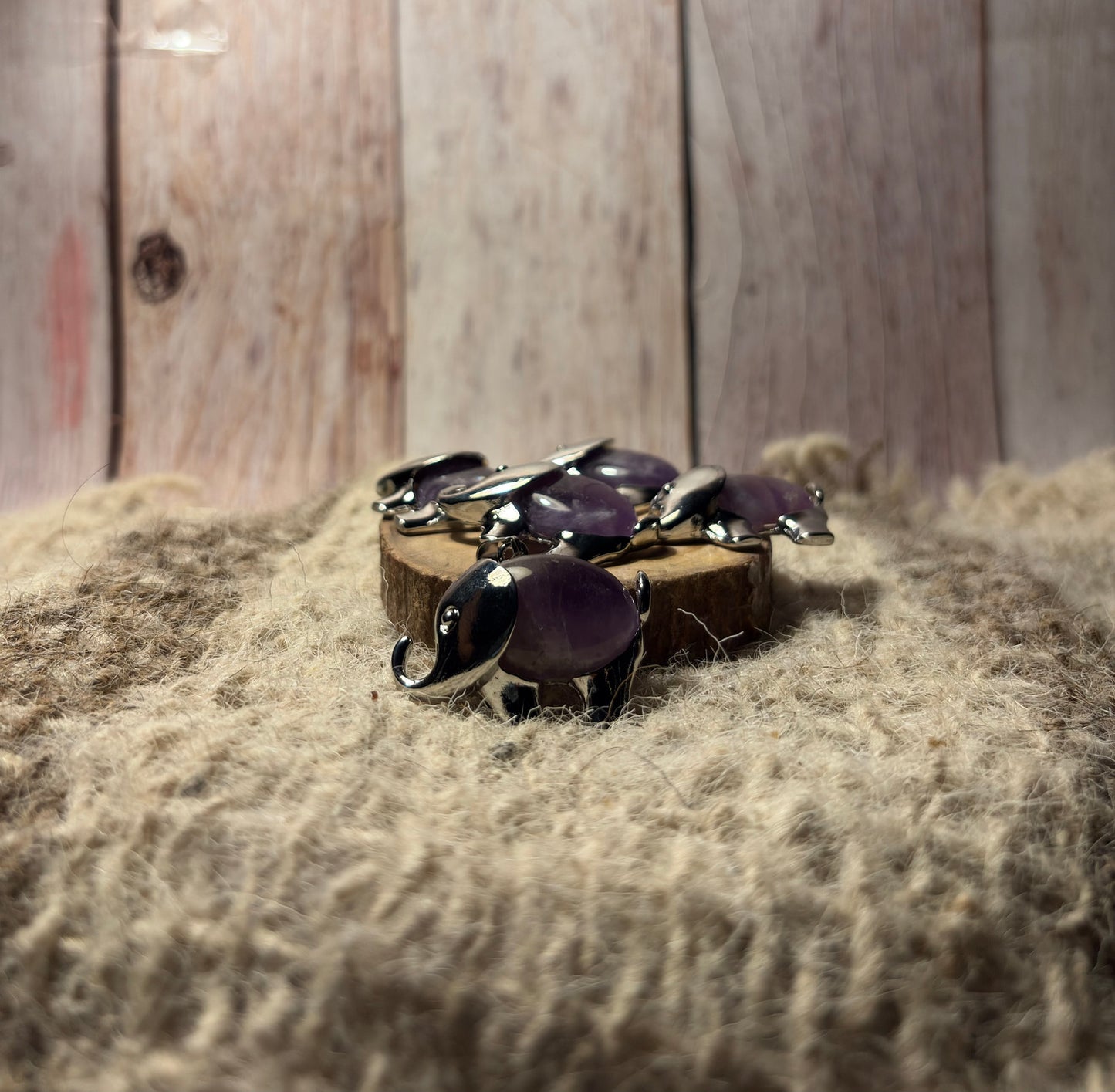 Amethyst Crystal Elephant Pendant for protection, intuition, spiritual growth, and emotional healing