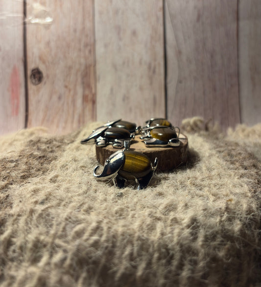 Tiger's Eye crystal elephant necklace for courage, prosperity, and personal power