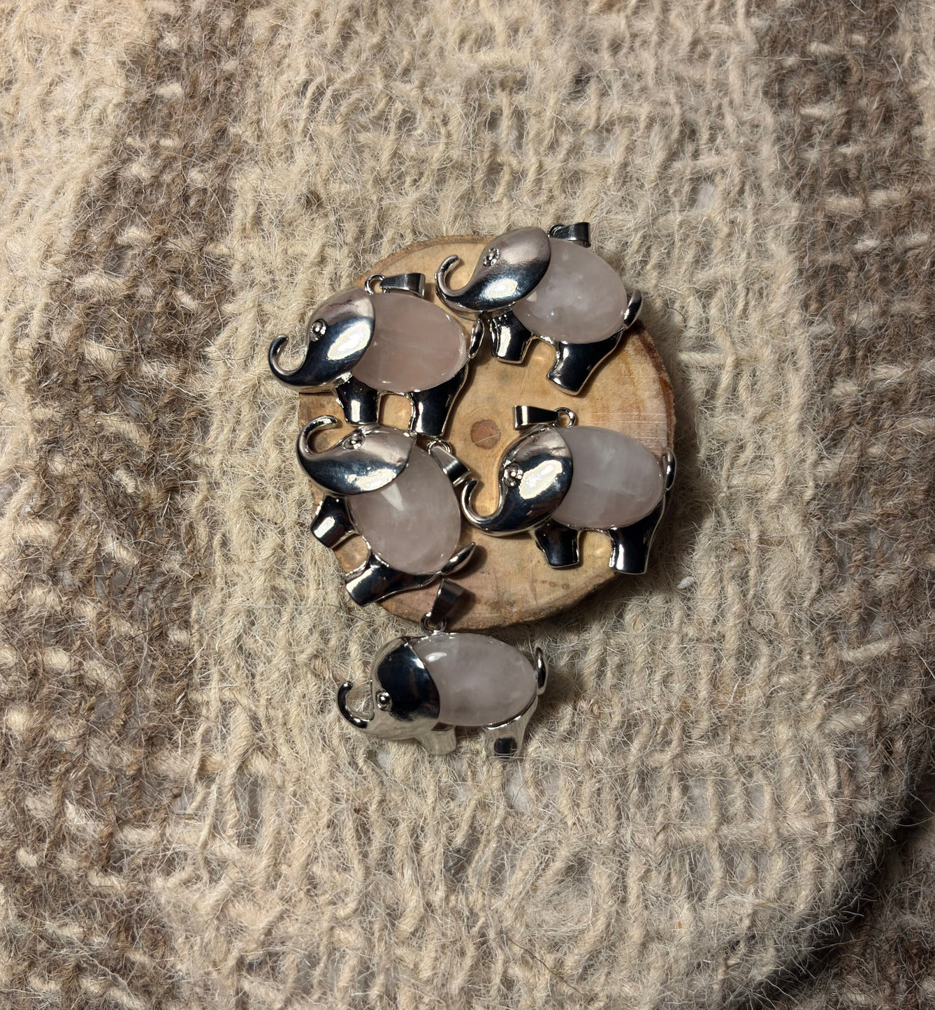 Rose Quartz crystal elephant necklace for love, compassion, and emotional healing