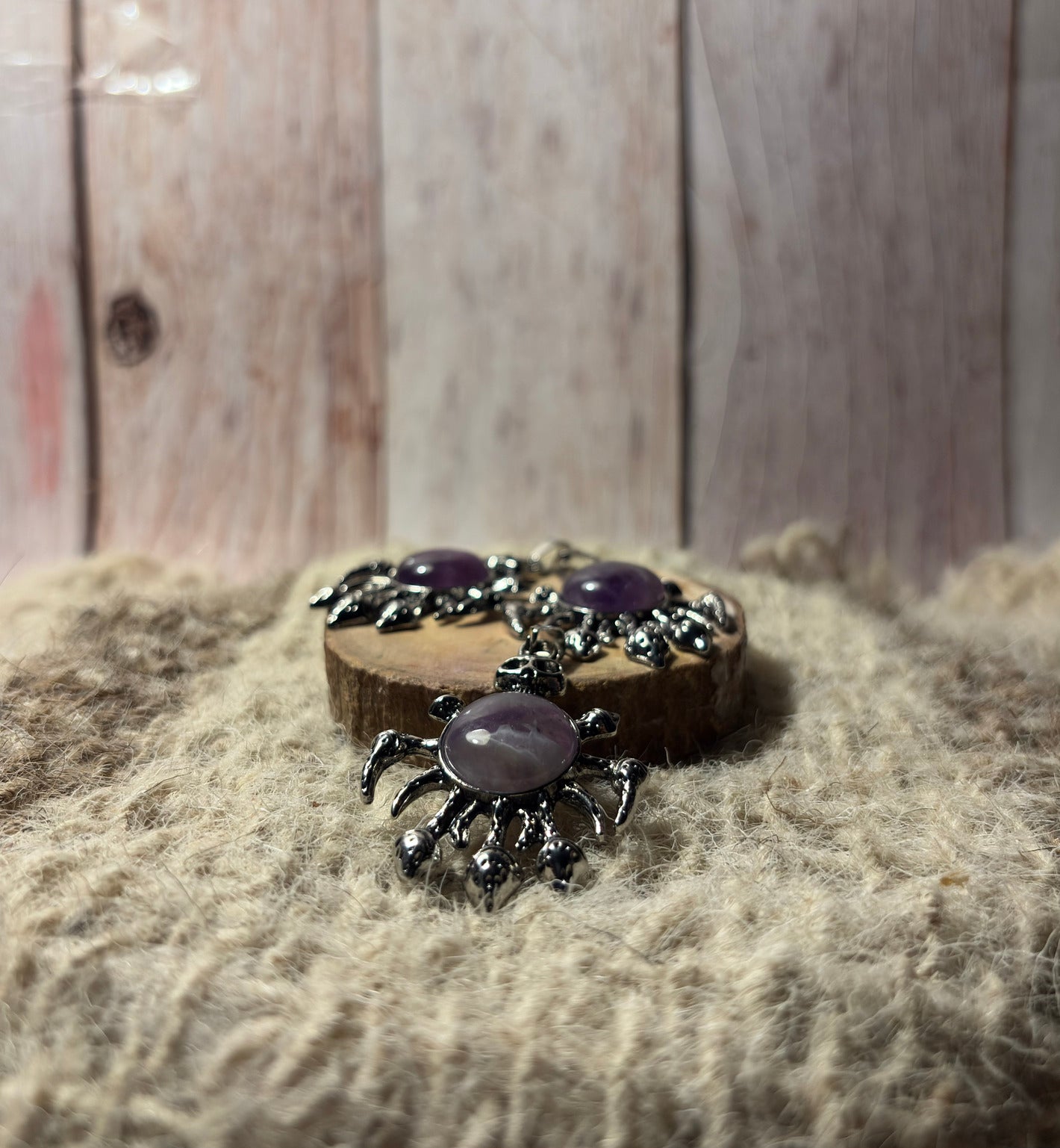 Amethyst Crystal Skull Pendant for intuition, spiritual protection, and transformation