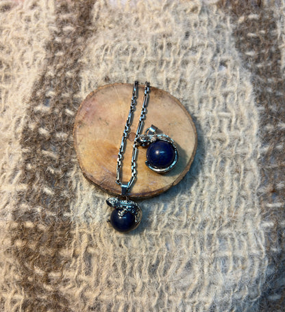 Lapis Lazuli crystal lizard necklace symbolizing wisdom, adaptability, and self-expression