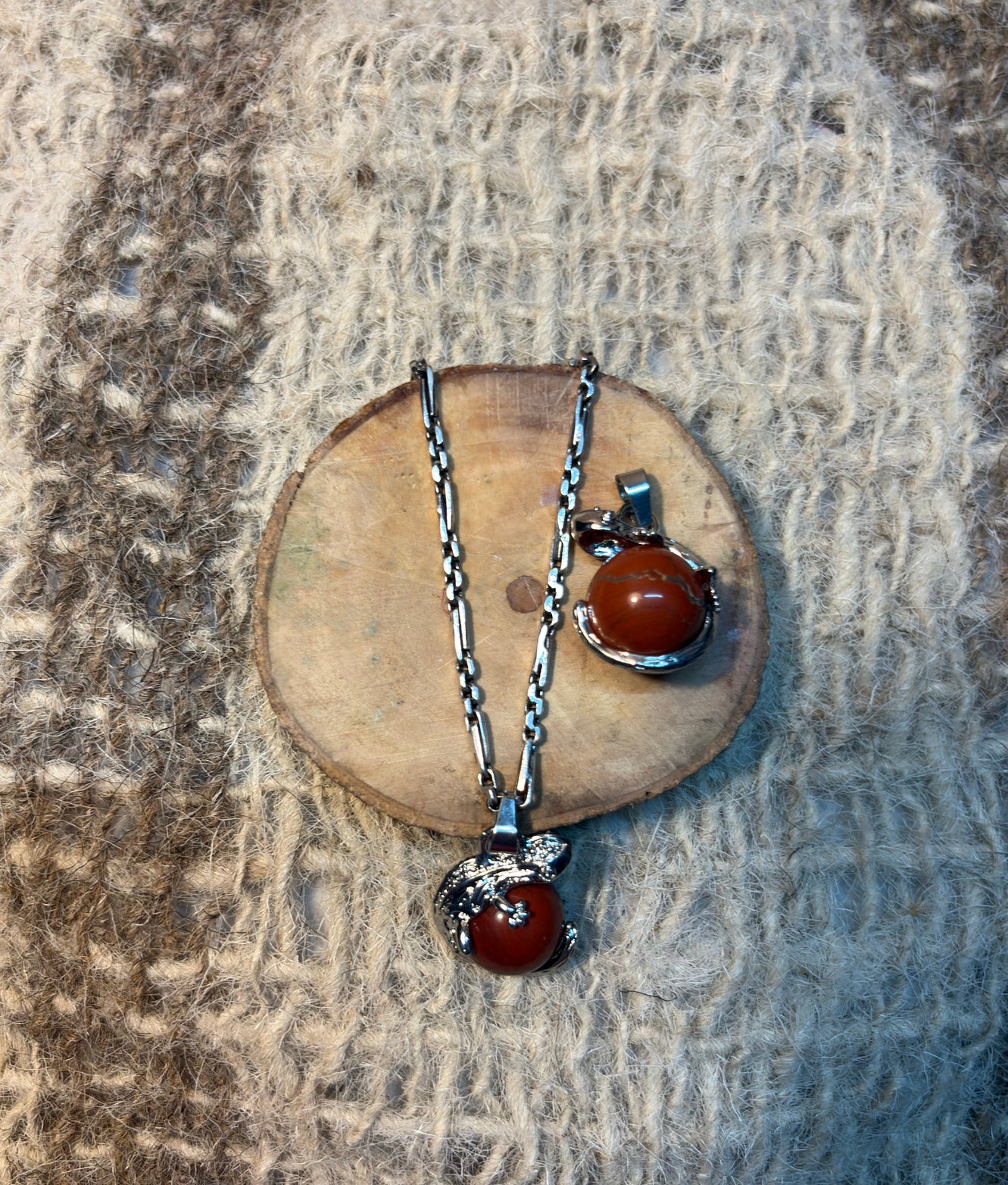 Red Jasper crystal lizard necklace symbolizing resilience, grounding, and personal growth
