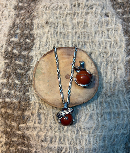 Red Jasper crystal lizard necklace symbolizing resilience, grounding, and personal growth