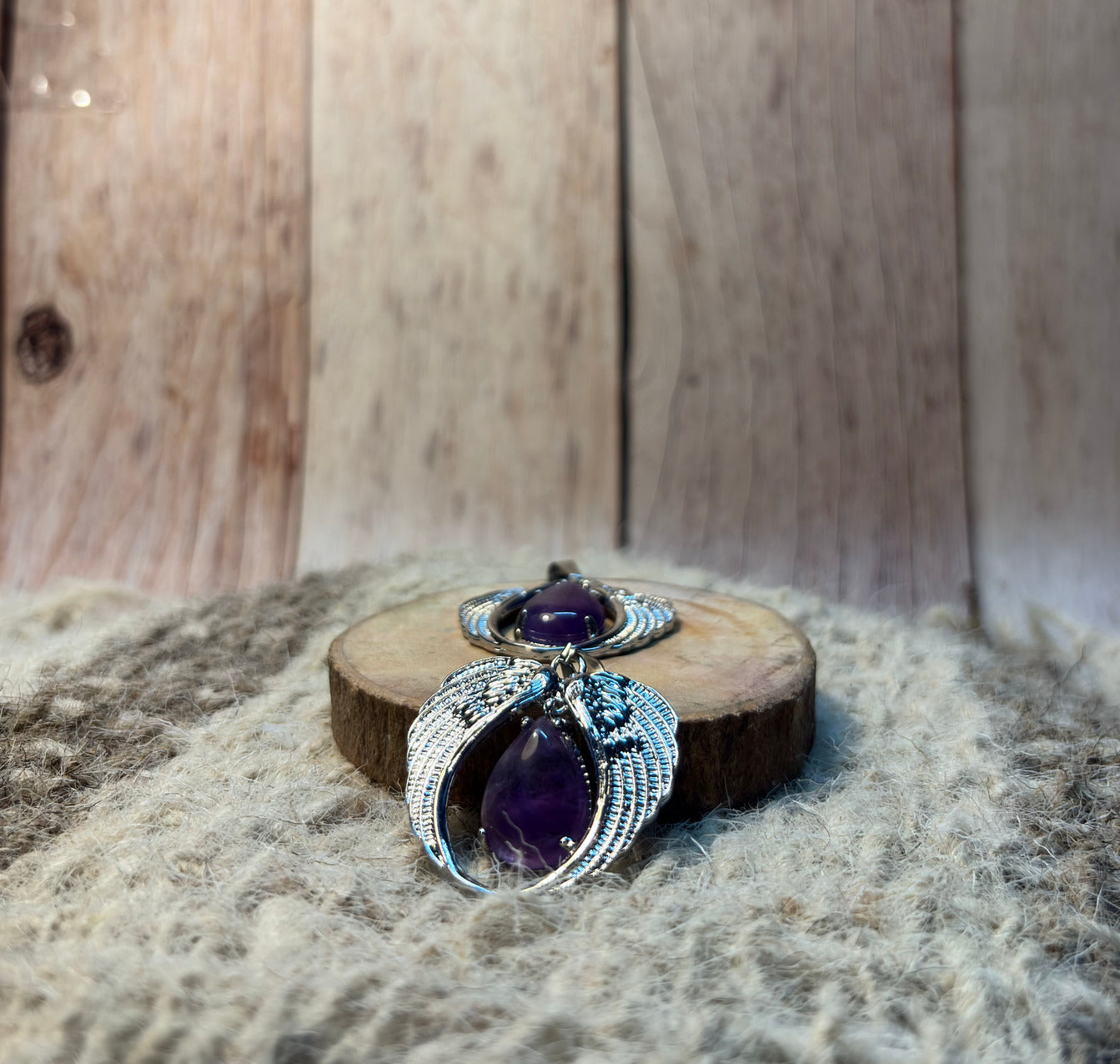 Amethyst Crystal Angel Wings Pendant for spiritual protection, intuition, and inner peace