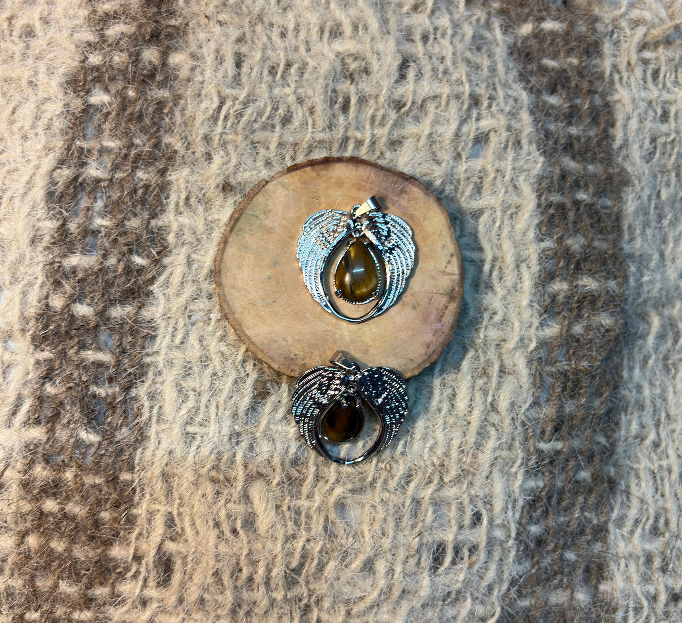 Tiger's Eye crystal pendant symbolizing courage, strength, and personal power