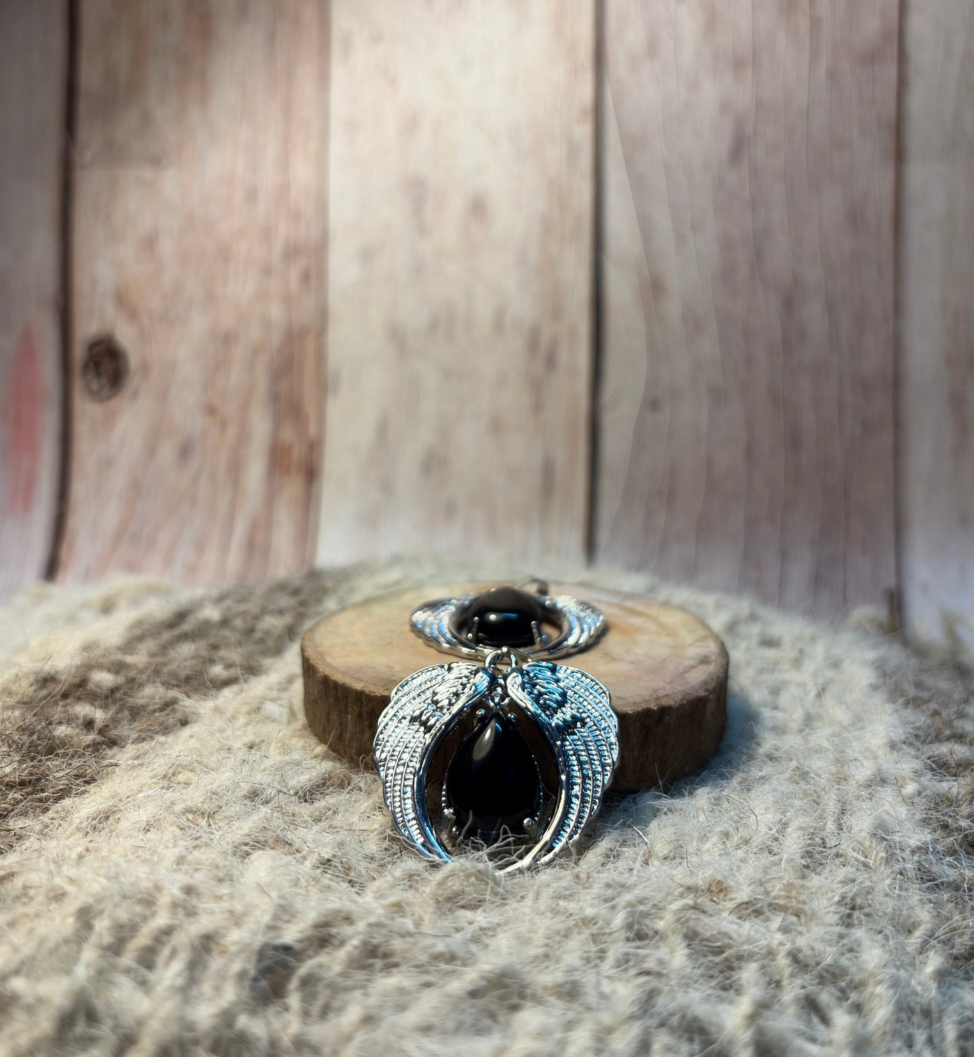 Black Obsidian Crystal Angel Wings Pendant for protection, grounding, and spiritual strength