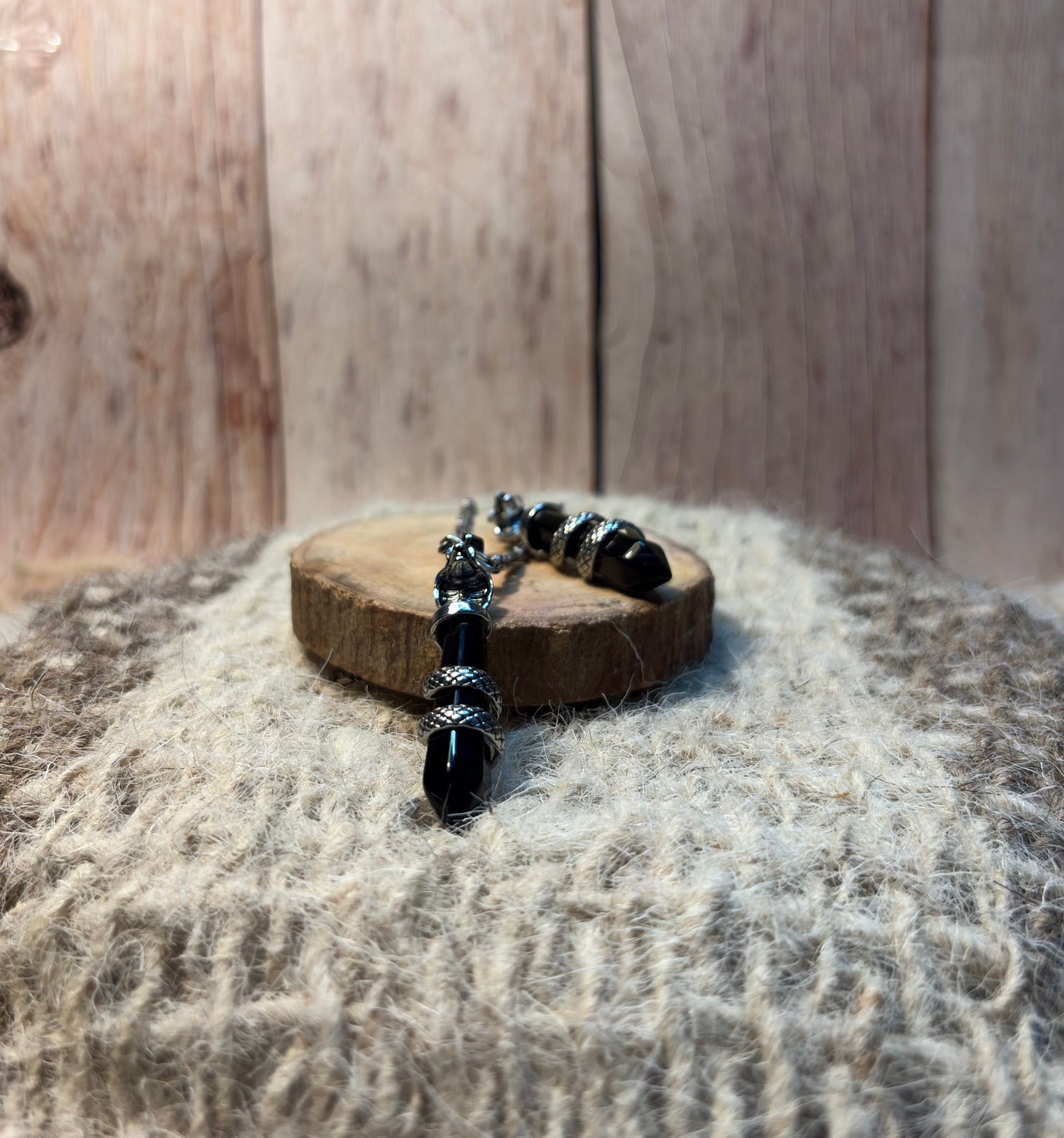 Black Obsidian Crystal Snake Point Pendant for protection, grounding, and transformation