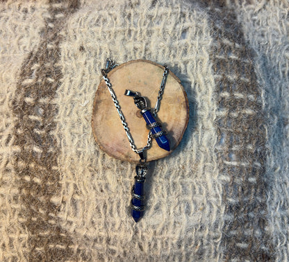 Lapis Lazuli crystal snake necklace symbolizing wisdom, transformation, and self-expression