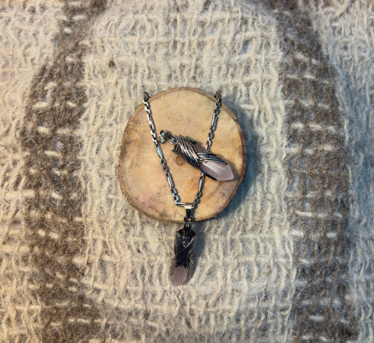 Rose Quartz crystal wings necklace symbolizing love, healing, and compassion