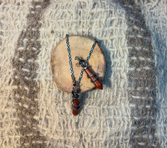 Red Jasper crystal snake necklace symbolizing strength, transformation, and resilience