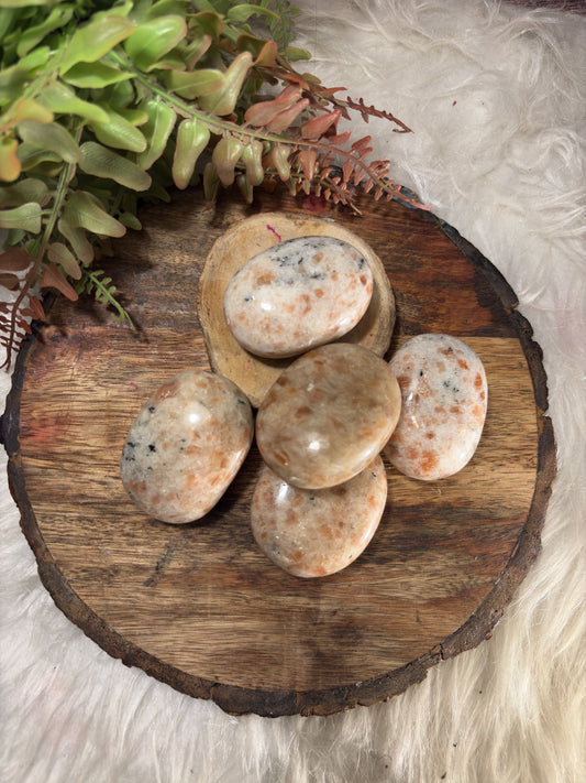 Sunstone crystal palm stone